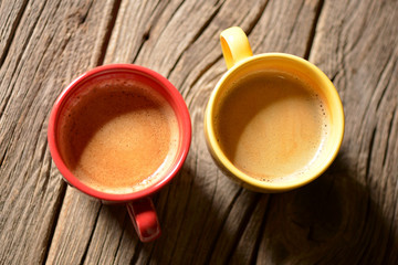 Coffee in a cup on a wooden table