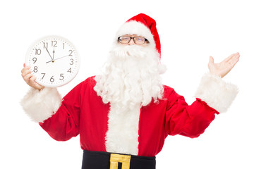 man in costume of santa claus with clock