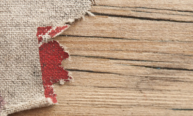 Texture of the burlap and old wood