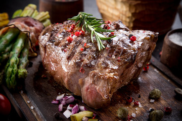 Beef steak on wooden table