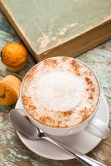 Cappuccino coffee with muffins