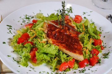 Delicious Recipe on Frisee Lettuce on White Plate