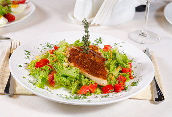 Delicious Recipe on Frisee Lettuce on White Plate