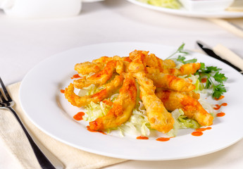 Appetizing Main Course on Table Utensils on Side