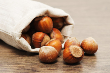 hazelnuts on a wooden table