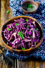 Obraz na płótnie Canvas Red cabbage salad with prunes