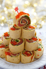 Salmon, cream cheese and iceberg lettuce pinwheels