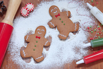 gingerbread man making a snow angel