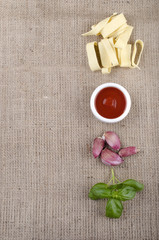 egg pasta pappardelle on brown jute