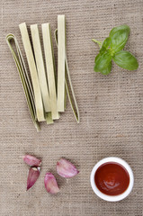 pappardelle pasta on brown jute