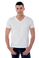 Young man with hands in his pockets