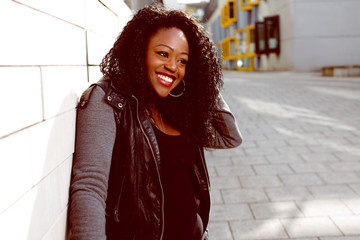 Happy Attractive Black Woman in Jacket