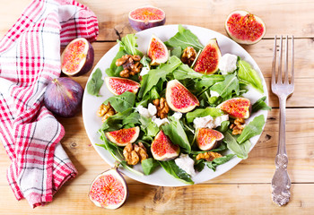 plate of salad with fresh figs