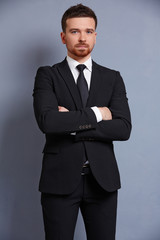 businessman in a suit smiling