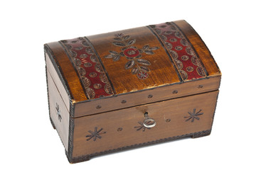 old scratched wooden casket with an ornament on a white backgrou