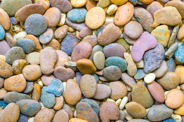 pebble stones background. closeup of stones texture