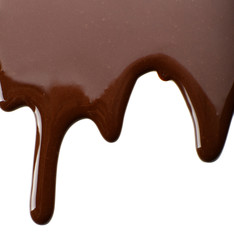 Melted chocolate dripping on white background