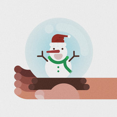 Snowman in grass ball on the hand by Christmas concept
