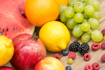 Summer Fruits On Wooden Table
