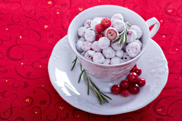 Candied cranberry in a decorative cup