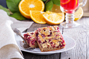 Berry cake bars with caramel almond topping