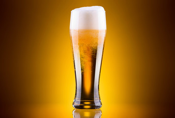 Frosty glass of light beer