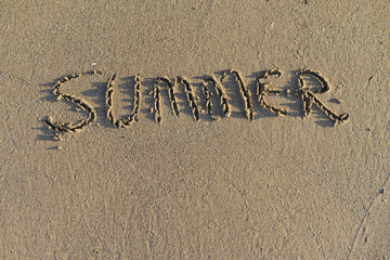 inscription on sea sand