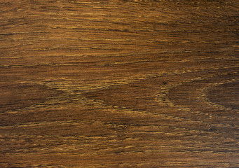 The texture of dark wood