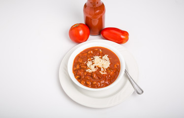 Chili and Rice in White Bowl with Fresh Tomatoes