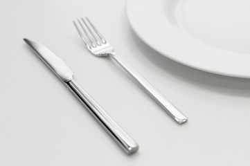 Place setting with plate, knife and fork