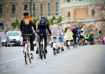 Fototapeta na wymiar Bicyclists on their way home