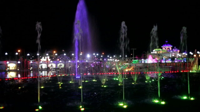 Beautiful night fountain with colored backlight