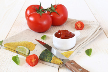 Ripe tomatoes and tomato ketchup