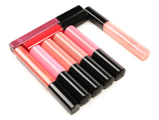 Beautiful lip glosses, isolated on white