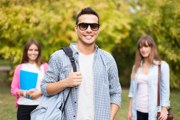 Smiling young man outdoor portrait