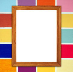 blank wood frame on colorful wood wall background