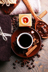 Cup with coffee drink, soap with coffee beans and spices