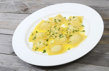 House ravioli a stuffing from ricotta and a potato with a butter