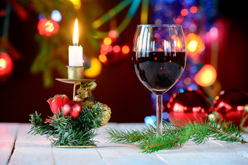 glass of red wine with Christmas decoration