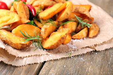 Homemade fried potato with spices and herbs