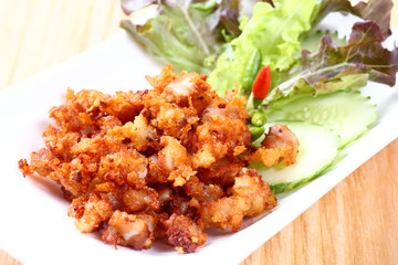 Deep fried sour fermented chicken knees tendon