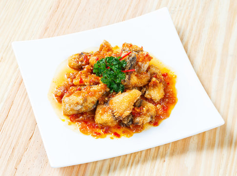 Deep fried grouper fish spicy sweet and sour sauce