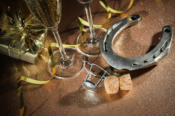 Cork from champagne bottle with a horseshoe