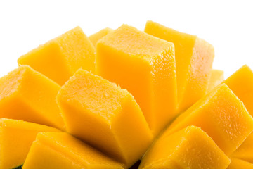 Mango cubes / slices close up isolated on white / Macro