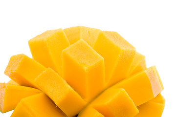 Mango cubes / slices close up isolated on white / Macro