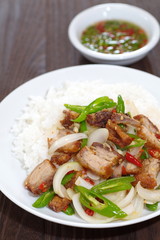 fried basil leaf with crispy pork and rice