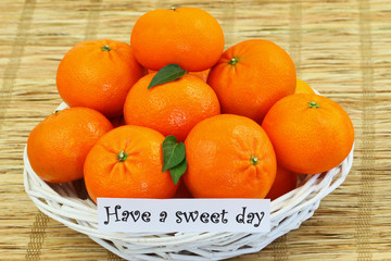 Have a sweet day with basket full of mandarines