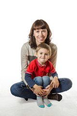 Mom holding her son in arms