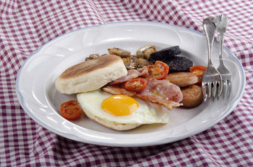 irish breakfast with muffin on a plate
