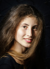 Cute young armenian girl posing in studio